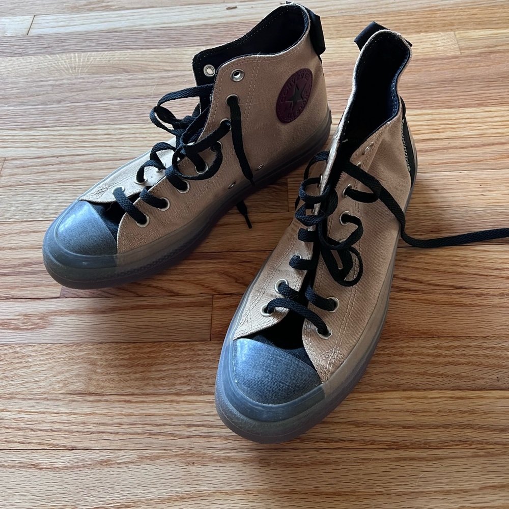 Tan, black, red Converse shoes
